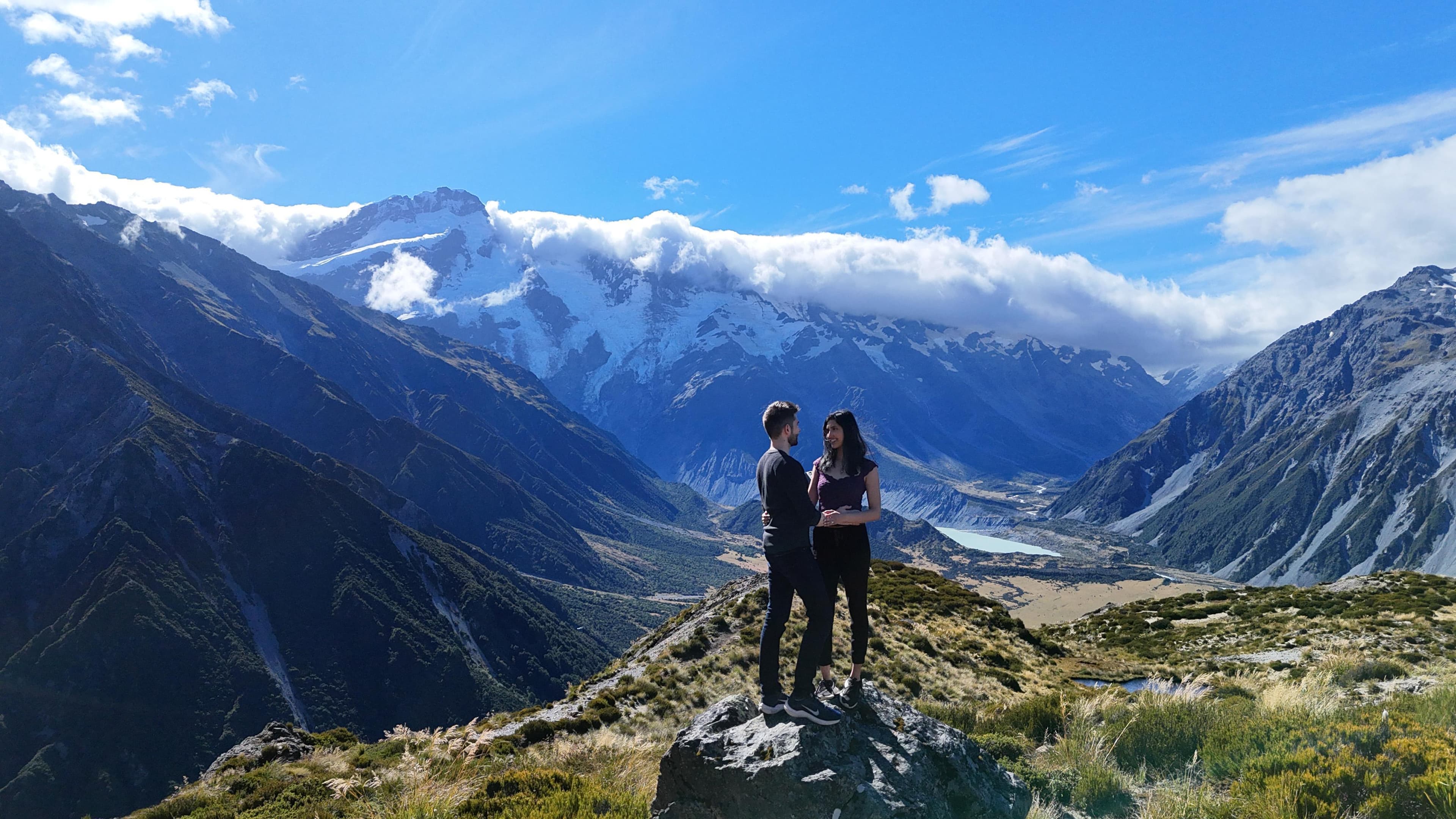Jack and Yasmin standing on a mountain ridge in New Zealand